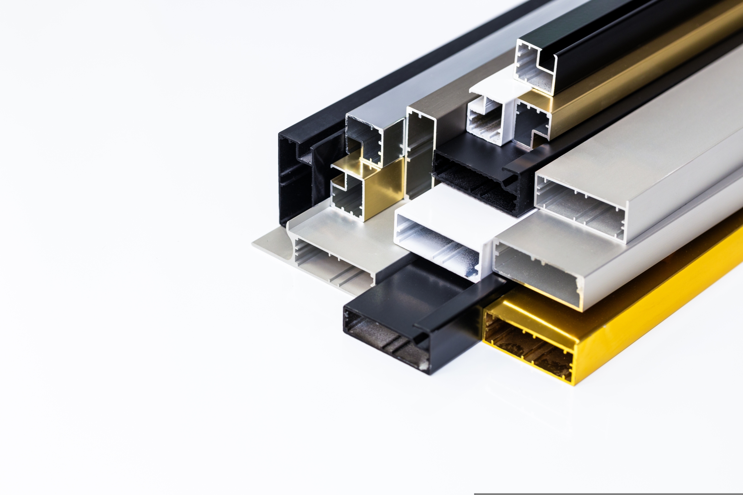 Aluminum,Profiles,On,A,White,Background,,Various,Shapes,And,Colors,