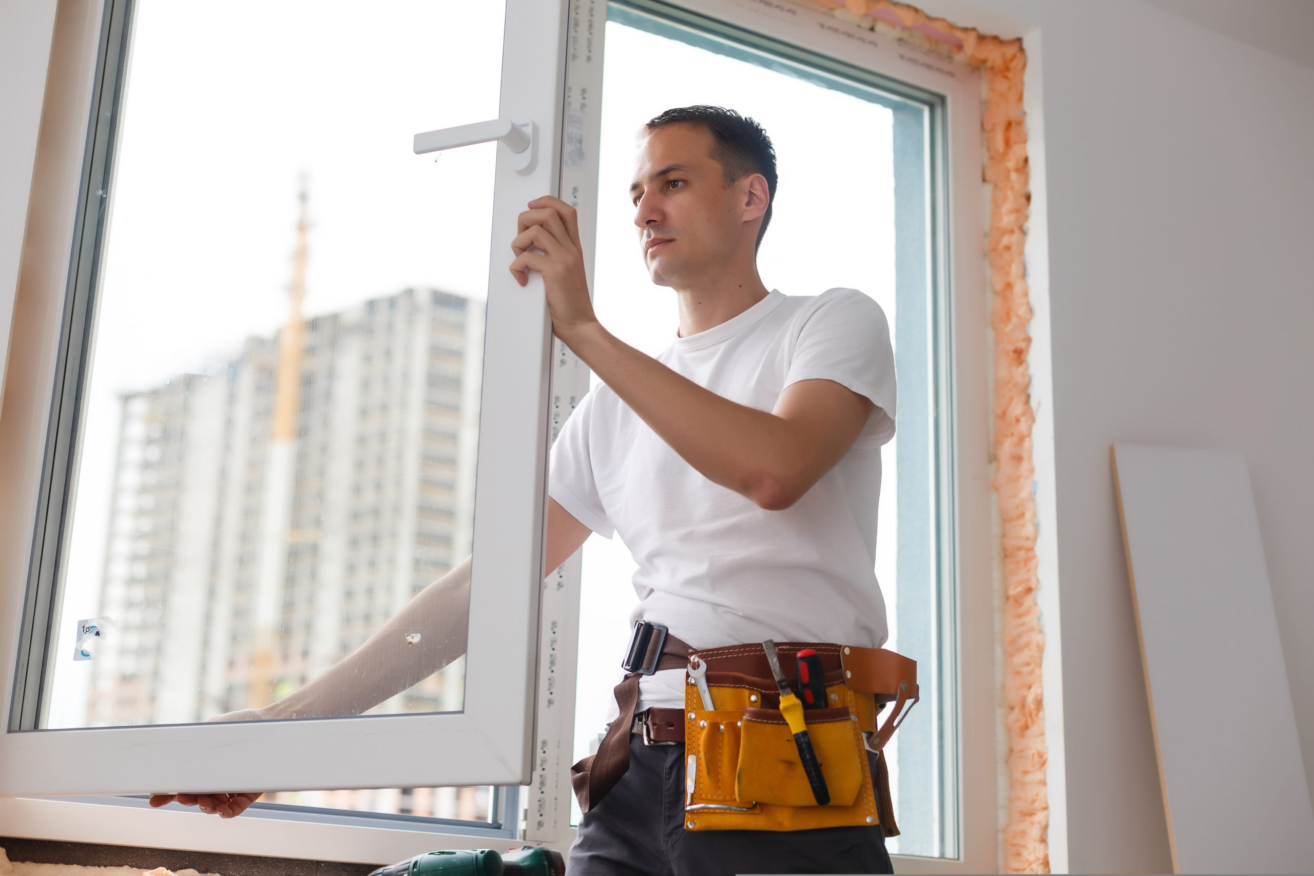 Young,Handyman,Repair,Window,With,Screwdriver Young,Handyman,Repair,Window,With,Screwdriver